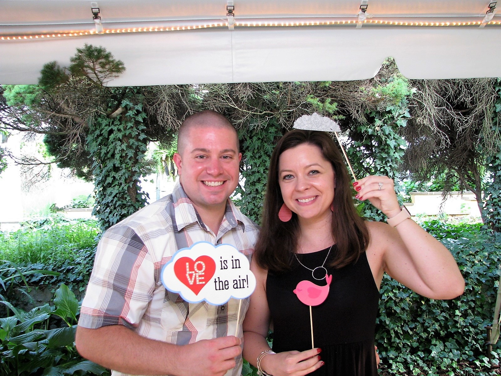 Booth Cover Image with two people posing for a photo